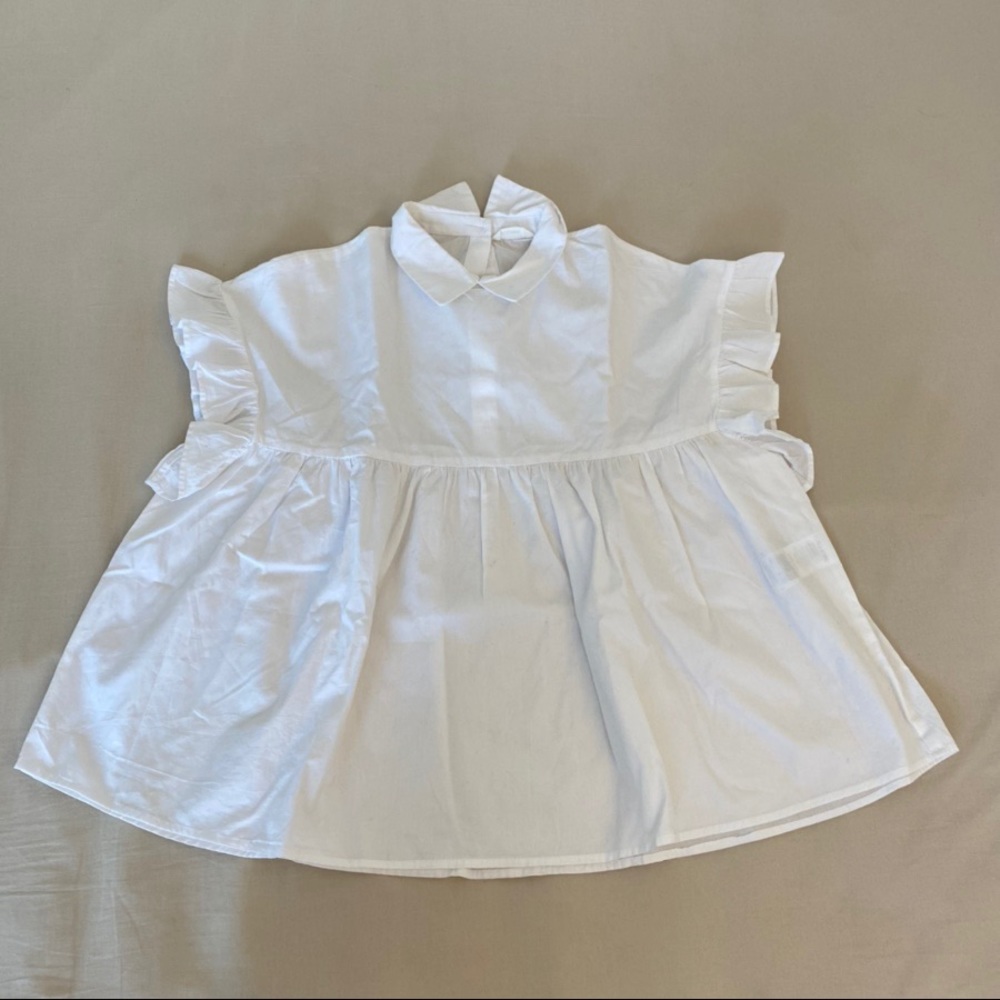 White blouse from calliope